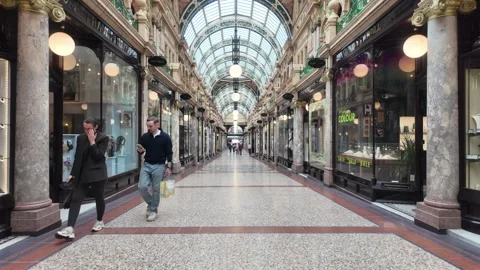 County Arcade - Shoppers Walking Through Historic Victorian Shopping Gallery. Stock Footage 338217793