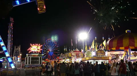 County Fair - Midway Amusement Park Rides (Editorial). Stock Footage