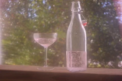 Coupe and Bottle Stock Photos