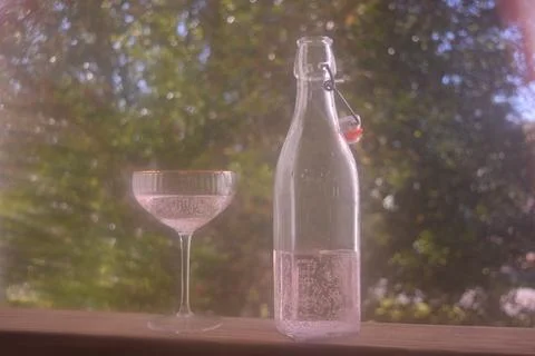 Coupe and Bottle Stock Photos