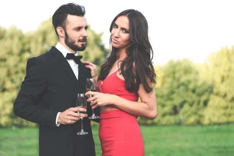 Coupl drinking champagne Stock Photos