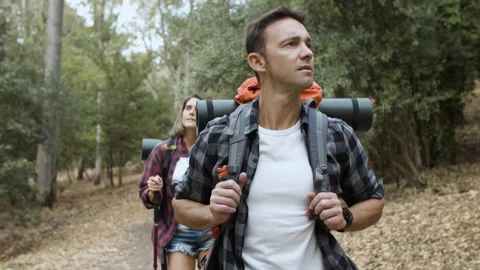 Couple of active tourists looking at landscape Stock Footage 150213311