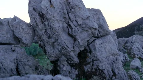 Couple admiring setting sun over mountain landscape Stock Footage 289139548