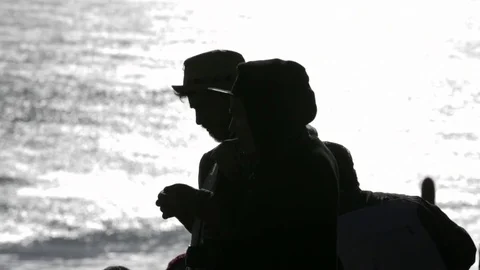 Couple against sea Stock Footage 77053543