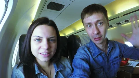 Couple in aircraft Stock-Footage 54491216