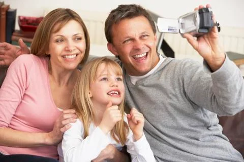 Couple And Daughter Using Computer 스톡 사진
