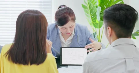 Couple and interior designer Stock Footage 163713483