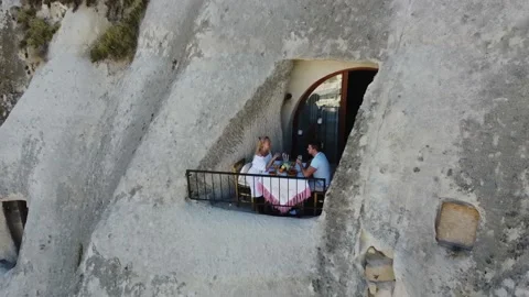 A couple and their romantic breakfast in Cappadocia drone video. Stock Footage 186483480