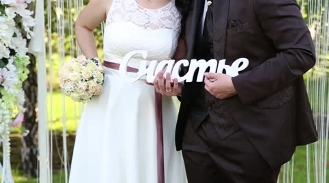 The couple and wedding arch Stock Footage 44387049