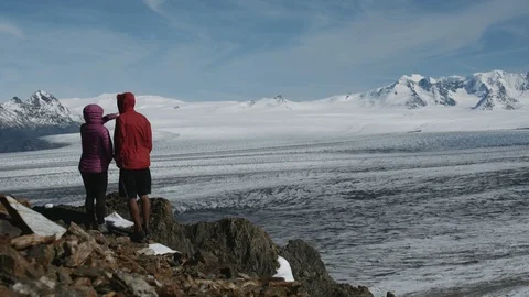 Couple appreciating the view of the Ice fields Stock Footage 89679630