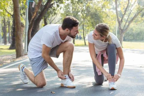 Couple are preparing to exercise. Stock Photos
