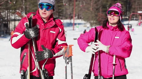 The Couple are Preparing to Skiing on a Beautiful White Mountain Stock Footage 60127382