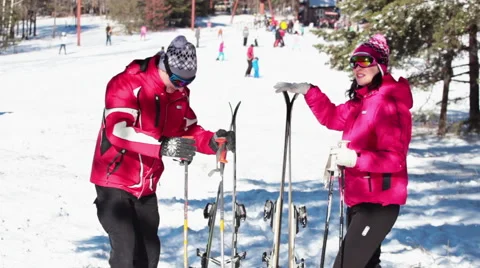 The Couple are Preparing to Skiing on a Beautiful White Mountain Stock-Footage 60249251