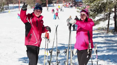 The Couple are Preparing to Skiing on a Beautiful White Mountain Stock Footage 60249484