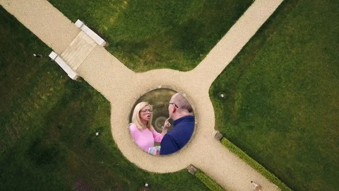 Couple argue and go separate paths Stock Footage 76664077