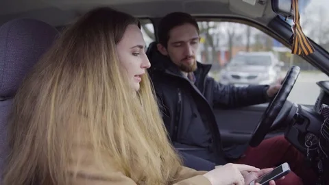 Couple arguing about wrong road in car 스톡 동영상 74718680