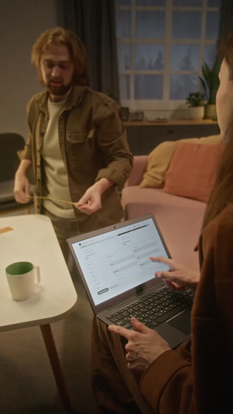 Couple Arguing over Table Dimensions during Online Furniture Shopping Stock-Footage 344877508
