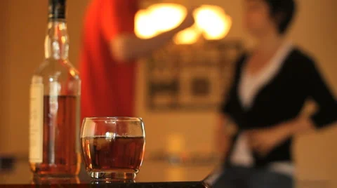 Couple Argument - Alcohol in Foreground Stock Footage 1064920