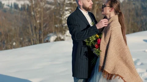 Couple on the background of snow-capped mountains Stock Footage 150621119