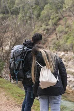 Couple with backpack exploring nature 3 Stock Photos