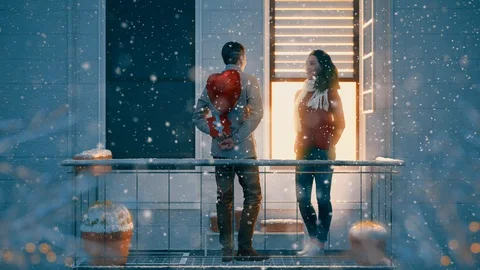 Couple on balcony on Valentine's day Stock Footage 101641844