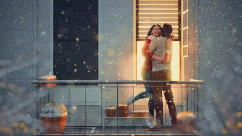 Couple on balcony on Valentine's day Stock Footage 101641941