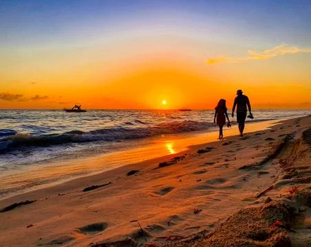 Couple on the beach 2 Stock Photos