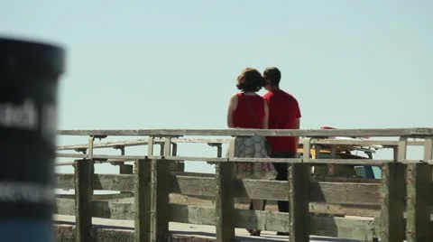 Couple on Beach Bridge Stock Footage 11441375
