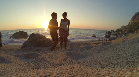Couple on the beach Stock Footage 34321659