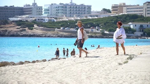 Couple at the beach Stock Footage 128347555