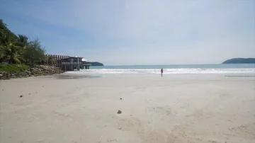 Couple at a beach at Malaysia Stock Footage 85625933