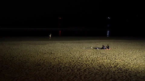 COUPLE IN THE BEACH AT NIGHT Video stock 160628771