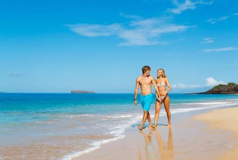 Couple on the beach Stock Photos