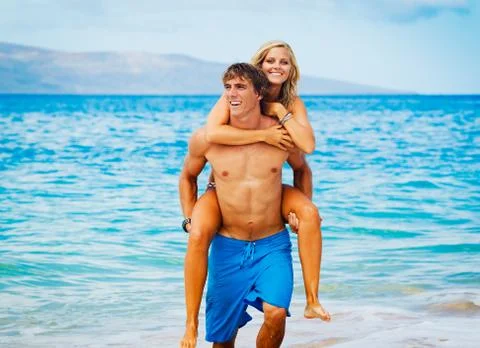 Couple on the beach Stock Photos