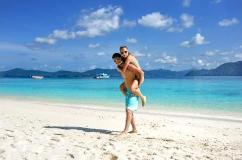 Couple on a beach Stock Photos