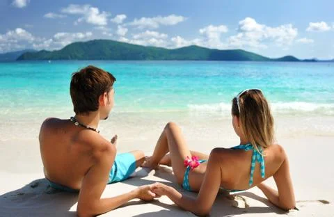 Couple on a beach Stock Photos