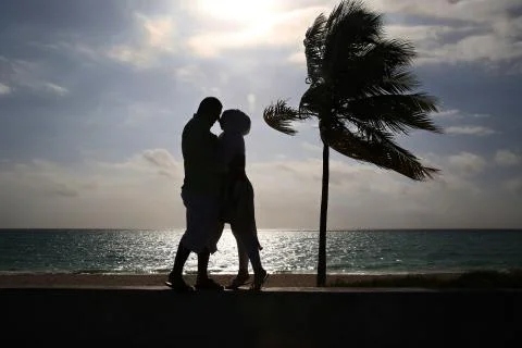 Couple on the beach Stock Photos