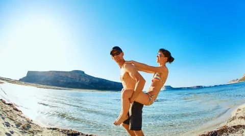 Couple on the beach Stock Photos