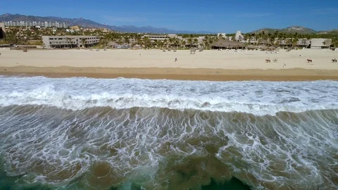Couple on beach revealing Ocean Waves Stock Footage 124689637