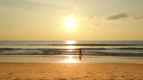 Couple on a beach in Sunset Stock Footage 22540783