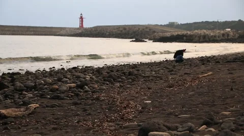 A couple on beautiful sand beach at sunset Stock Footage 59131617