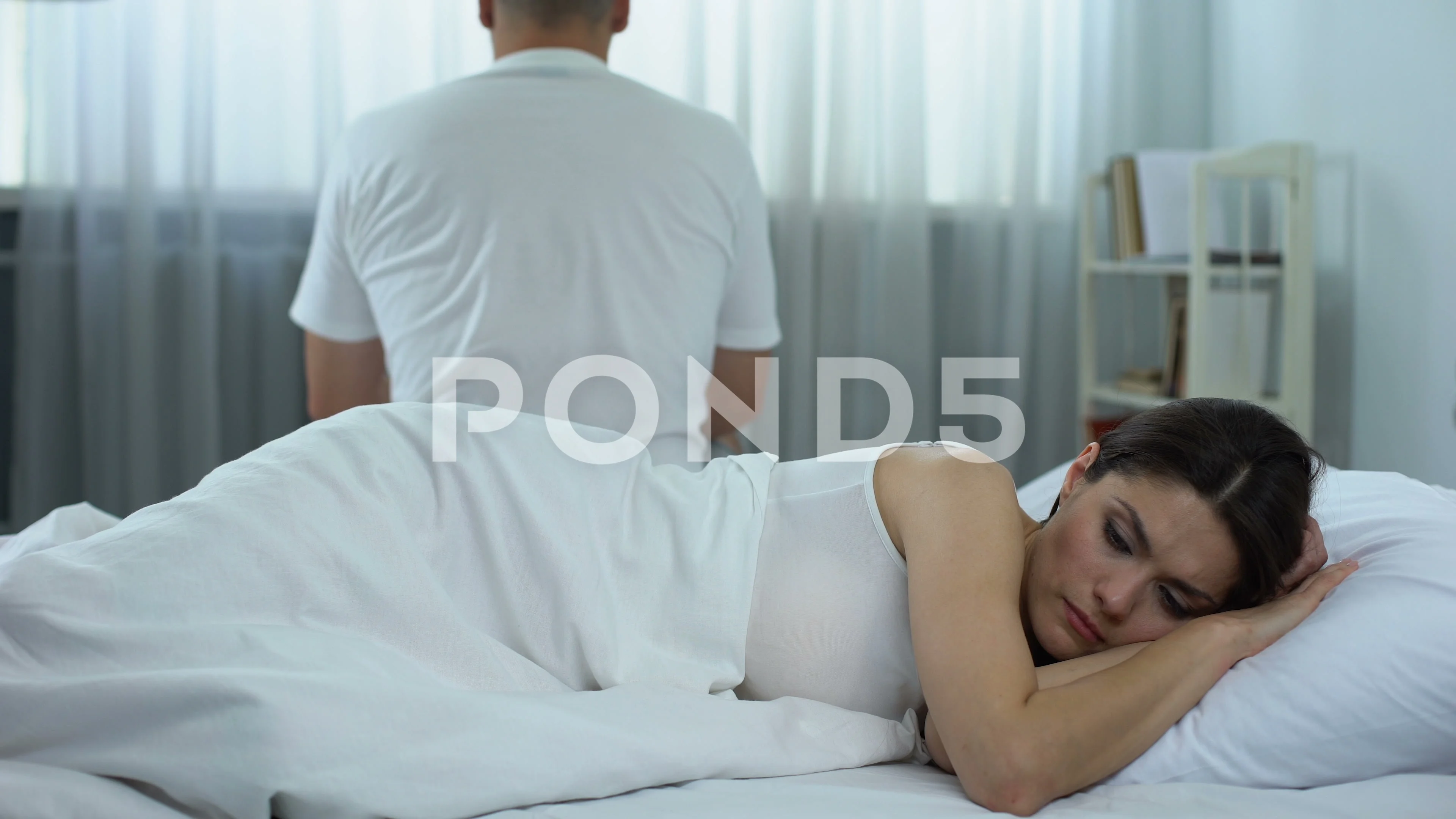 Couple in bed after quarrel, cheating problem in family, relationship crisis