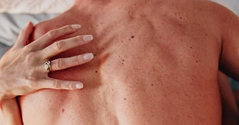 Couple, bed and hands on back with sex or intimacy, foreplay and passionate for Vídeos de archivo 274542593