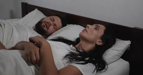 Couple in bed 스톡 동영상 166729036