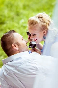 A couple on bed in meadow Stock Photos