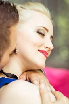 A couple on bed in meadow Stock Photos