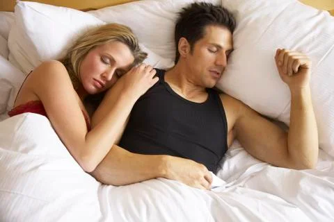 Couple in Bed Stock Photos