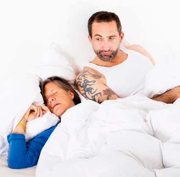 Couple in bed Stock-Fotos