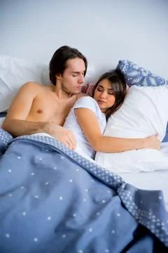 Couple in bed Stock Photos