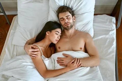 Couple in bed Stock Photos
